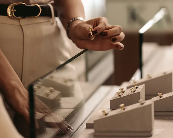 A woman browses the engagement ring showroom at Kavalri