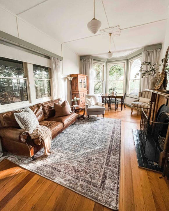 A room with antique furniture, one of the best Dandenong Ranges accomodation.