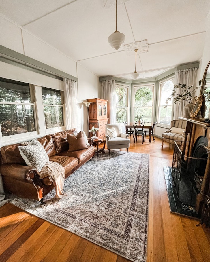 The living space at Woolrich Historic Garden Cottage one of the best Dandenong Ranges Airbnbs