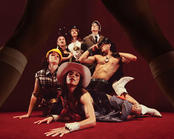 A group of dancers dressed like the Village People slay.