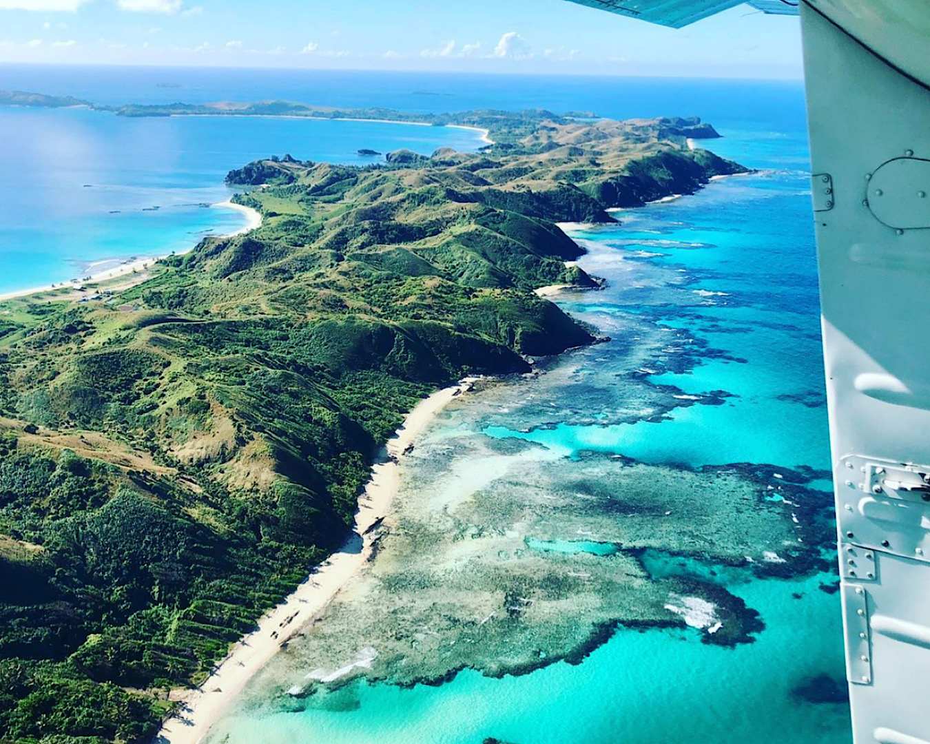 View of the Yasawa Islands and coral reef from a plane. 