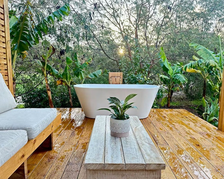 The outdoor bath with a view at Yind’ala one of the best WA tiny homes