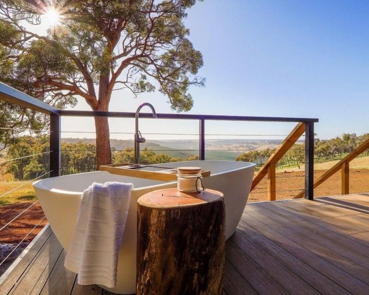The outdoor bath on the deck at Yira At Serenity Gully best Airbnbs WA