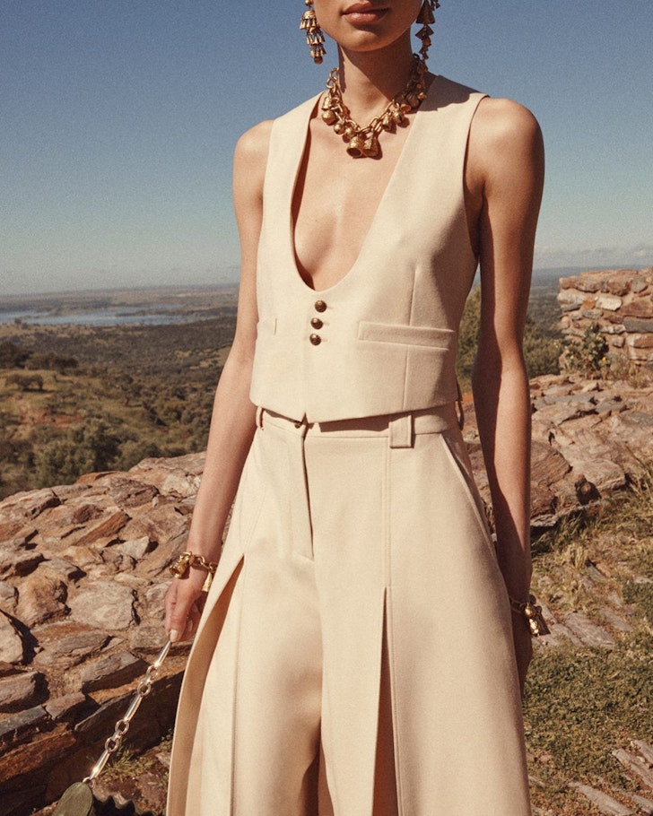 A model wears a neutral tailored outfit from Zimmermann one of the best Australian fashion labels