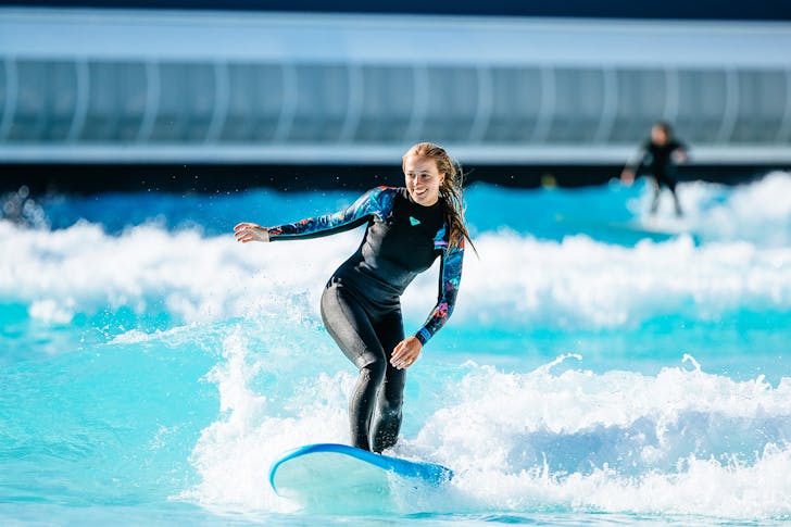 Woman surfing.
