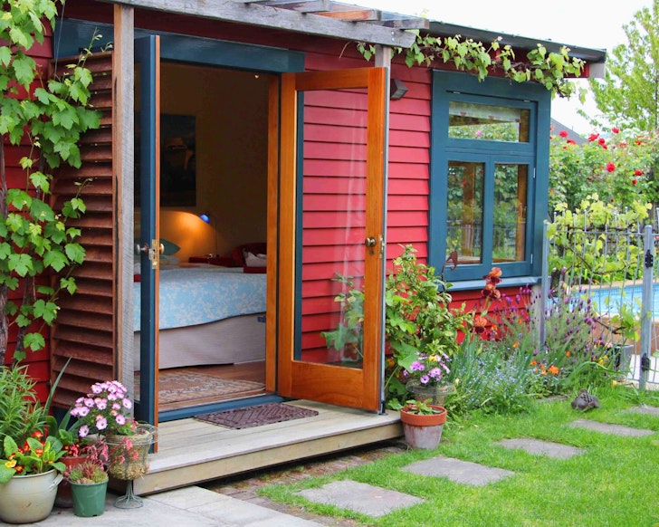 An exterior view of ​Peaceful Garden Studio best Christchurch Airbnbs
