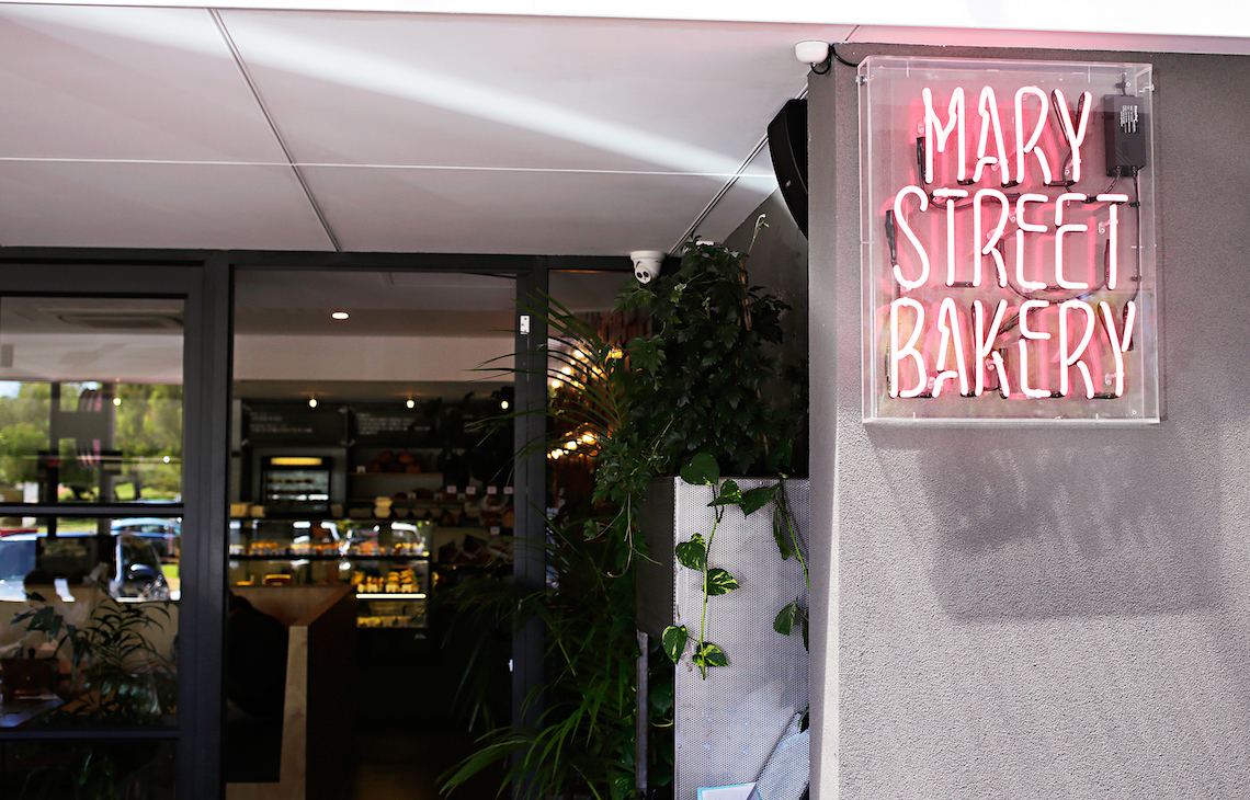 Mary Street bakery neon sign at the front of their store