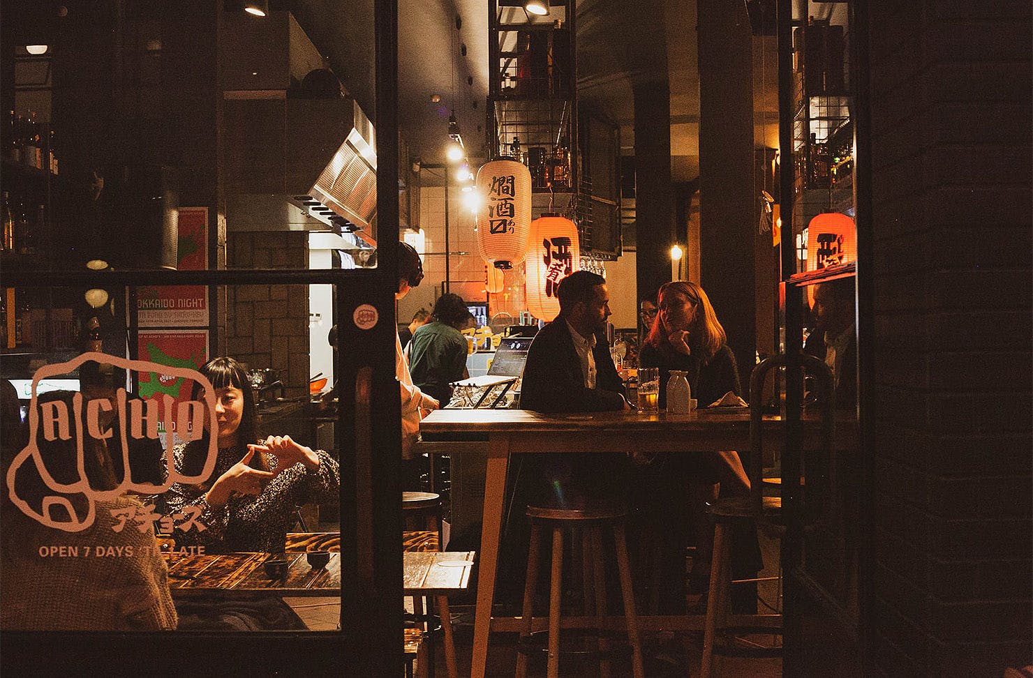 People dine at Acho's on Karangahape Road.