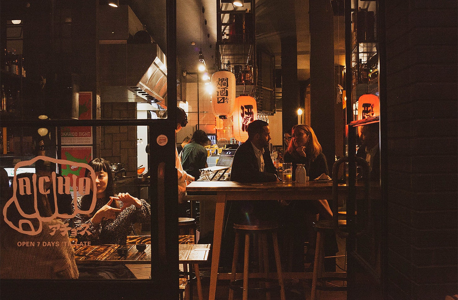People dine at Acho's on Karangahape Road.
