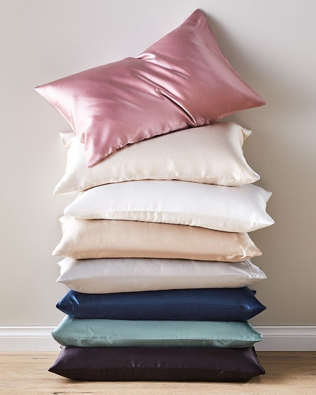 A stack of gorgeous silk pillowcases from Adairs.