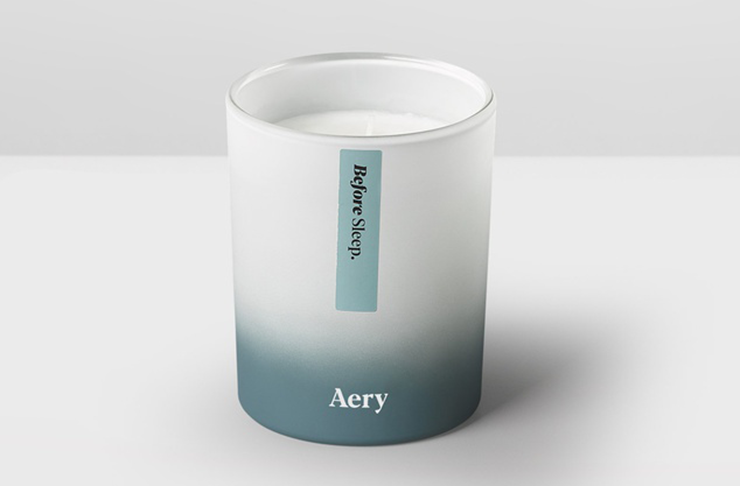 One of the best scented candles Australia has to offer, coloured white with an aqua fade up the casing.