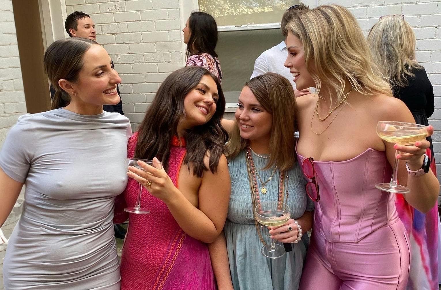 Four woman dressed up out for a few drinks