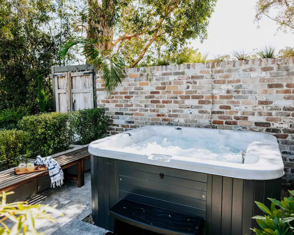 The hot tub at The Hatch Jervis Bay, one of the best Airbnbs for groups in NSW