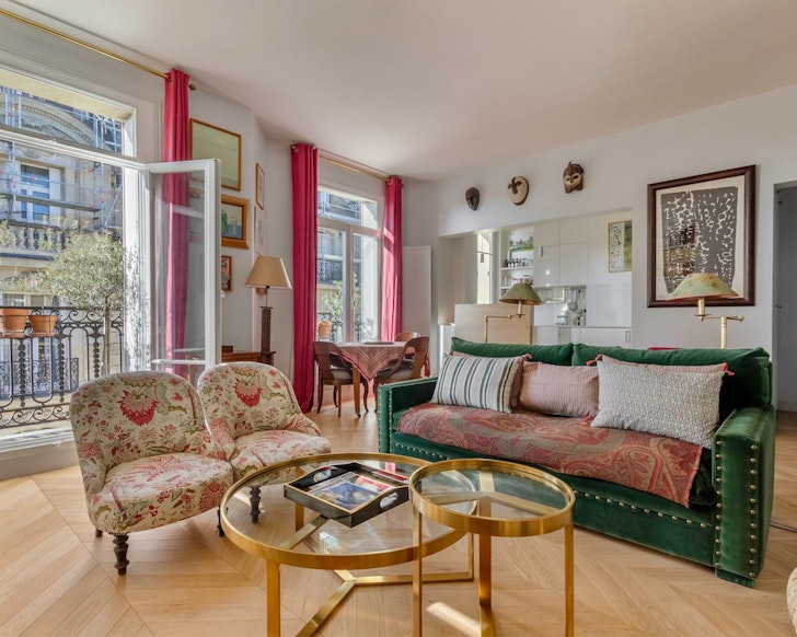 lounge area inside an airbnb with eiffel tower views 
