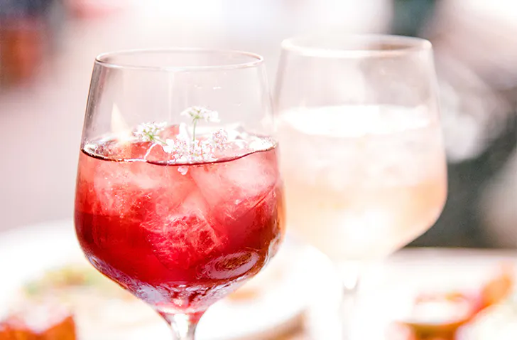 a red and a white cocktail