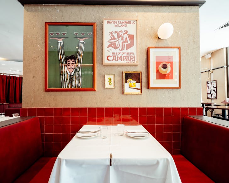 Red-boothed dining room at Bar Allora