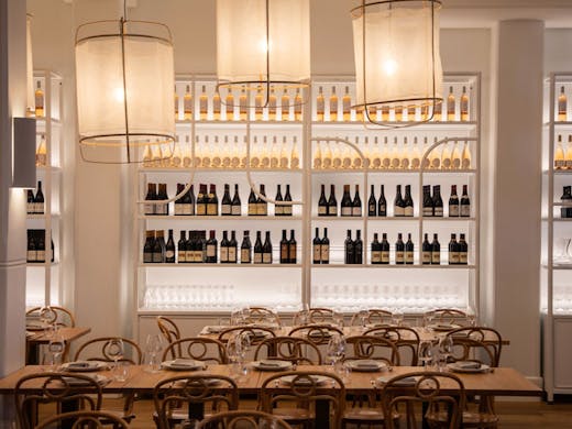 The white dining room at Alpha restaurant in Sydney