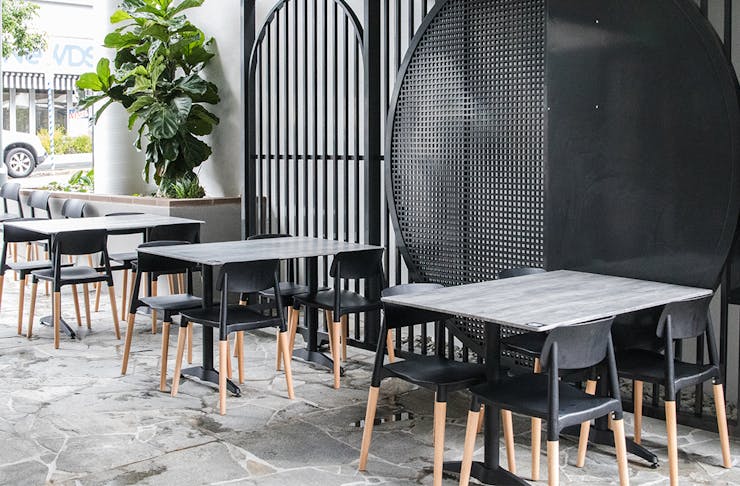 tables in a laneway