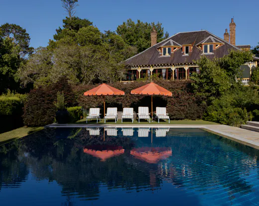 Heritage-listed Blue Mountains estate with a resort-style pool, manicured gardens and mountain retreat charm.