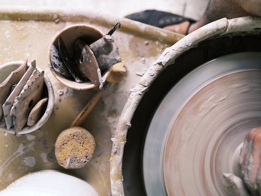 a pottery wheel and tools