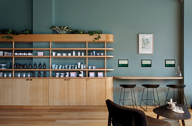 A green and oak covered interior of Australia's first female-led cannabis dispensary.