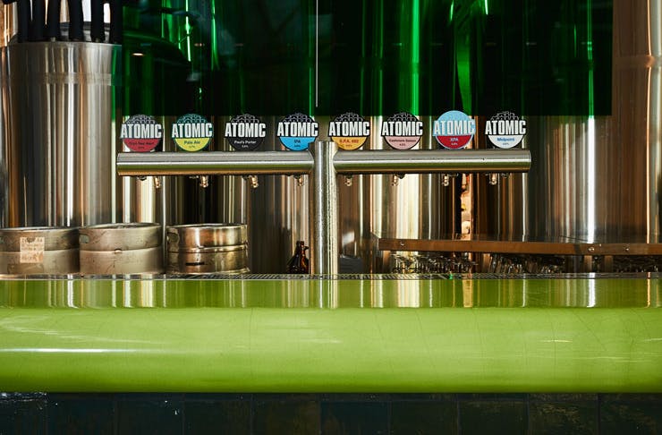 The lime green resin bar at Atomic Beer Project in Redfern, Sydney. 