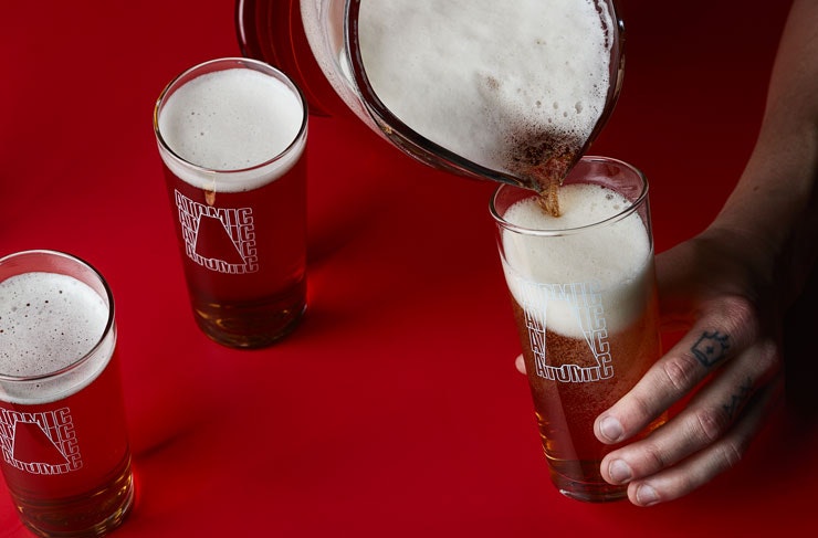Beers being poured at Atomic Beer Project in Redfern, Sydney. 