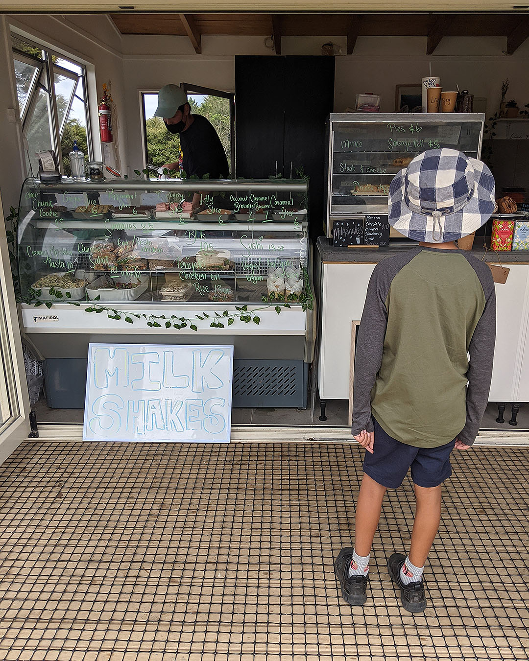 A child looks at the goodies on offer at Baked On Barrier.
