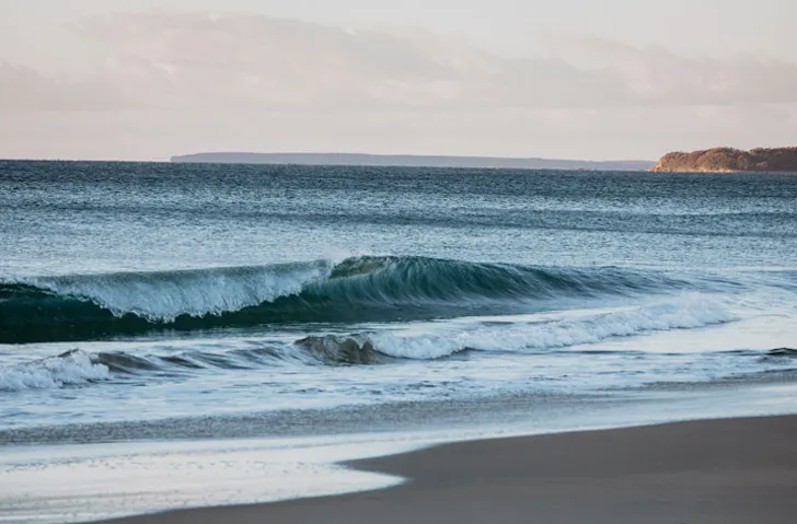 The surf at Seven Mile Beach. 