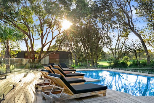 The pool at Shoalhaven Heads' luxury beachside retreat, Bangalay Villas.