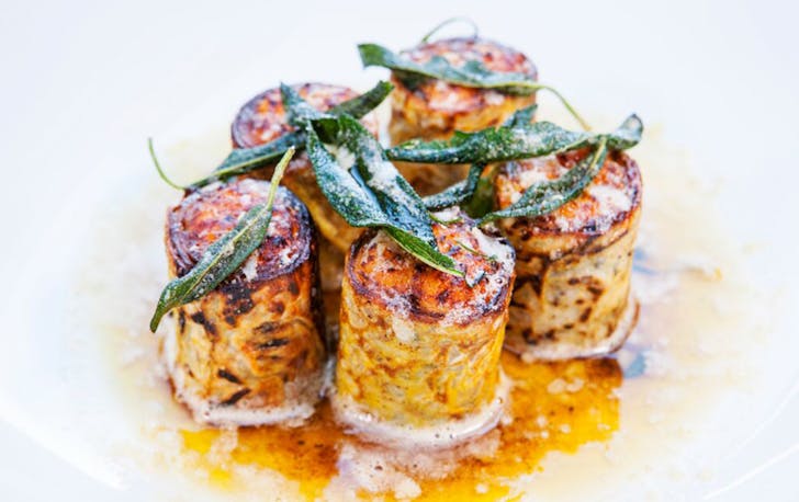 a plate of pumpkin and ricotta crespelle 