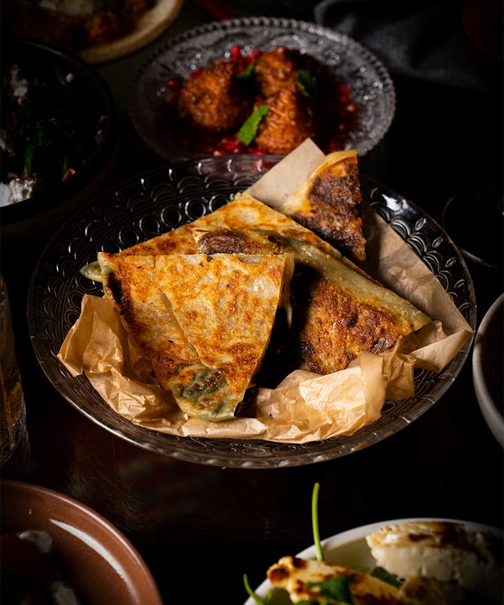 a plate of crispy middle eastern pastries
