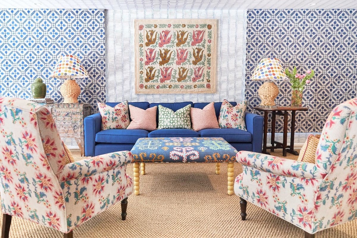 a lounge room with everything in a busy, colourful print