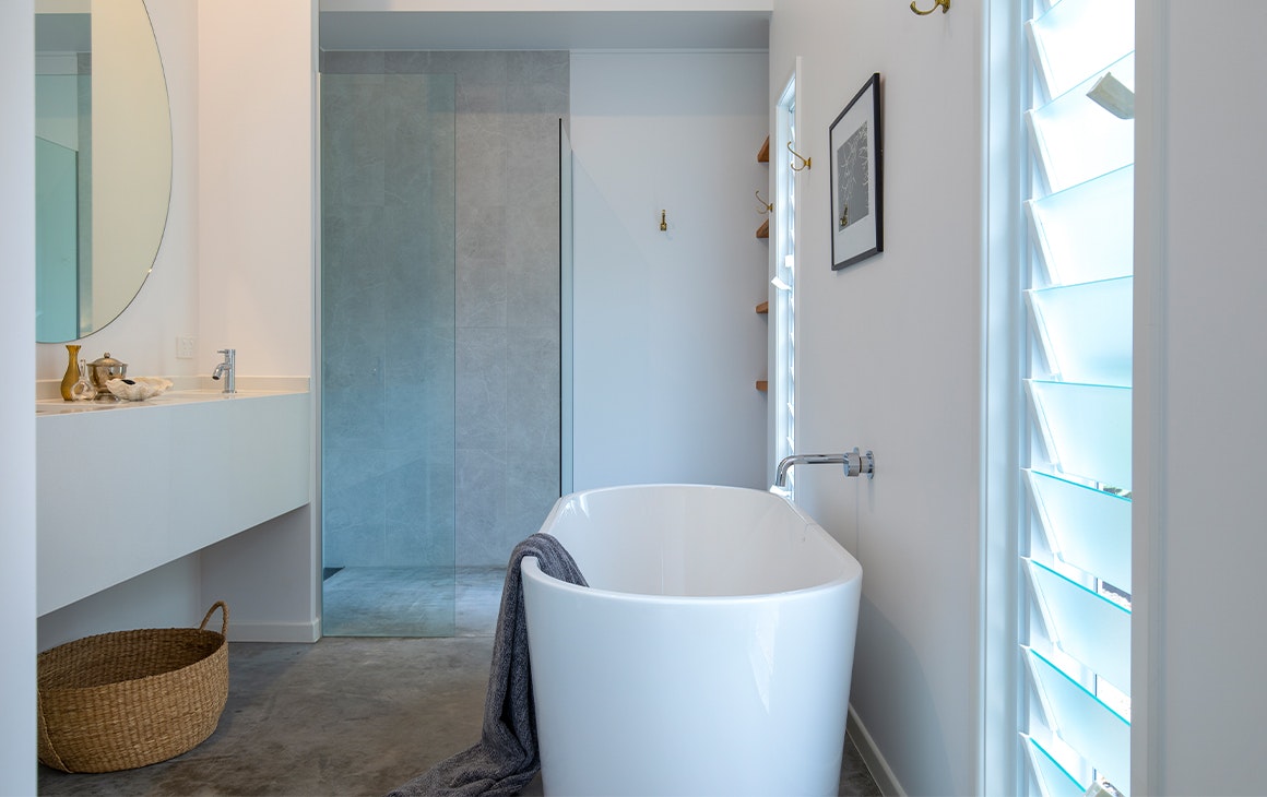 a bathroom with a large bath