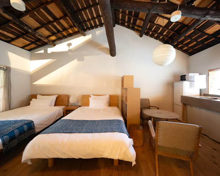 The timber bedroom of a beautiful Airbnb in Osaka.