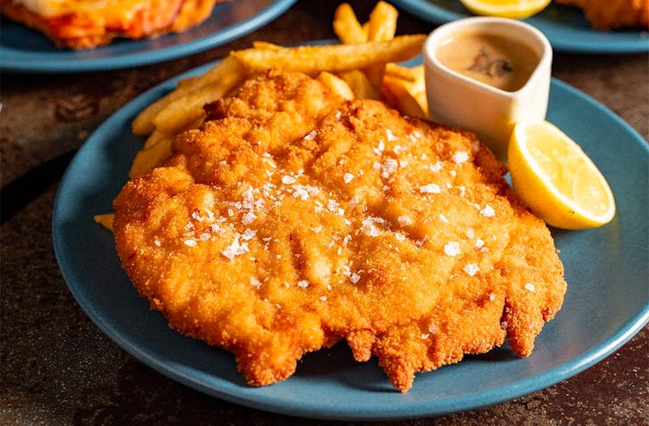 A simple schnitzel on a plate at The Bavarian.
