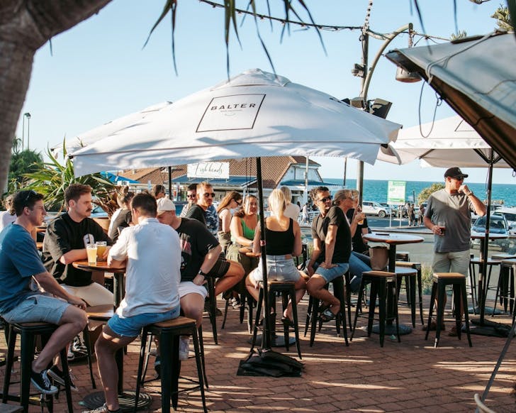 A busy beer garden at Beach Hotel in Byron