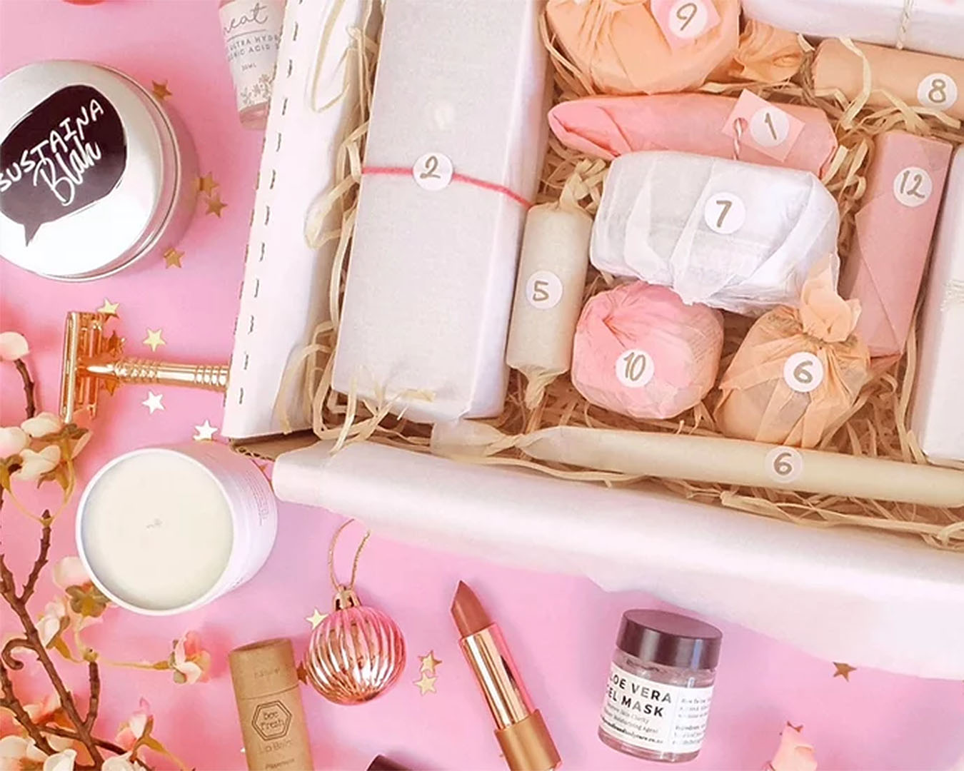 The beauty days beauty advent calendar boxed up with unwrapped products spread around.