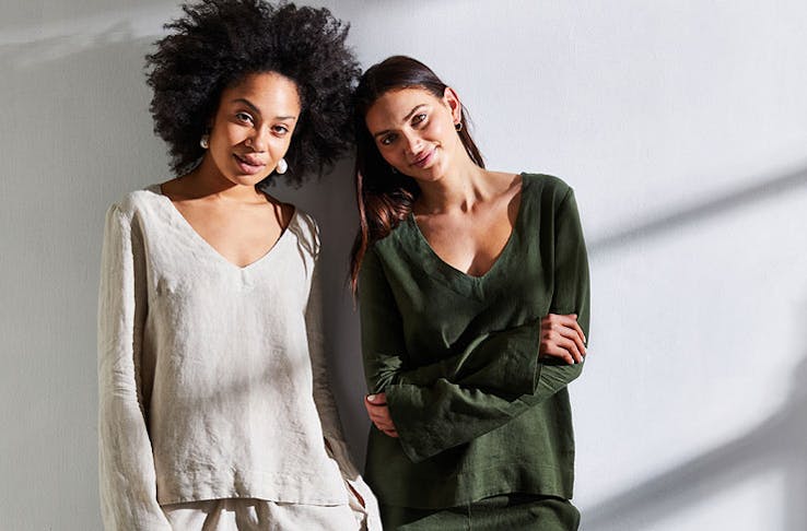 Two models wear Bed Threads' sleepwear in ivory and olive colours. 