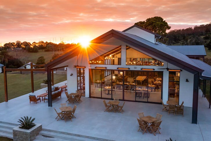 the front of The Paddock restaurant at sunset