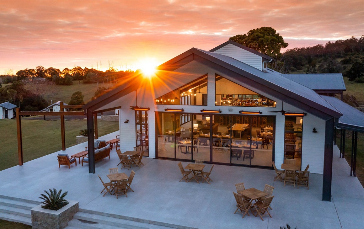 the front of The Paddock restaurant at sunset