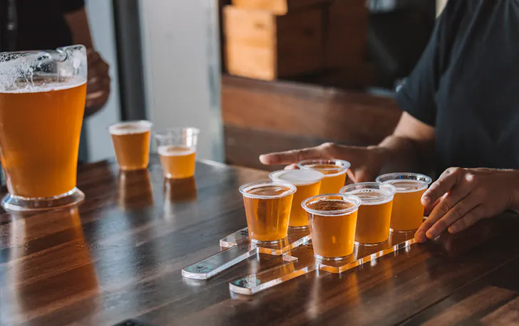 a beer paddle on a bar