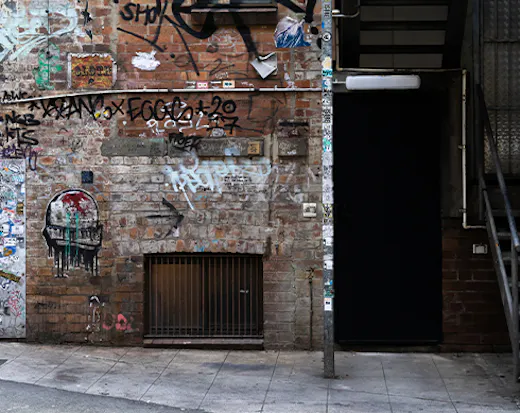a door in an alleyway