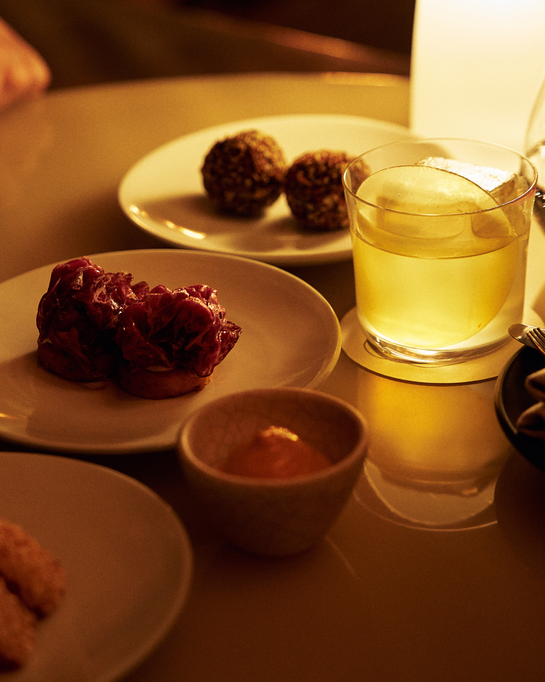 bennelong in 45 minutes three bar snacks displayed alongside a signature cocktail