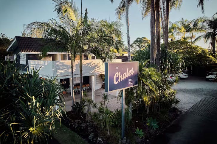 Palm trees surround The Chalet Motel, which is some of the best accommodation in Brunswick Heads. 
