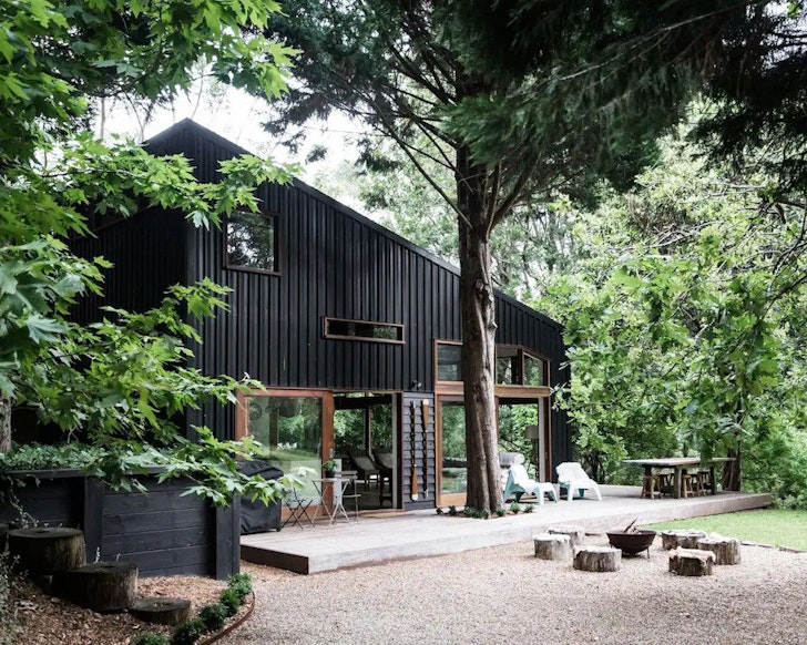 The black exterior of Milkwood Barn one of the best NSW Airbnbs