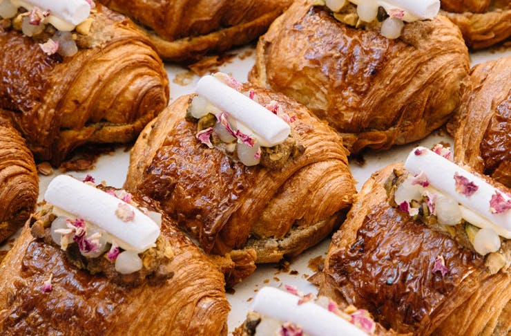 Rows of decorated croissants