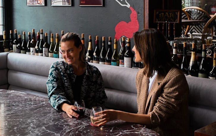 Two women enjoying a wine at Willi's bar in Perth CBD
