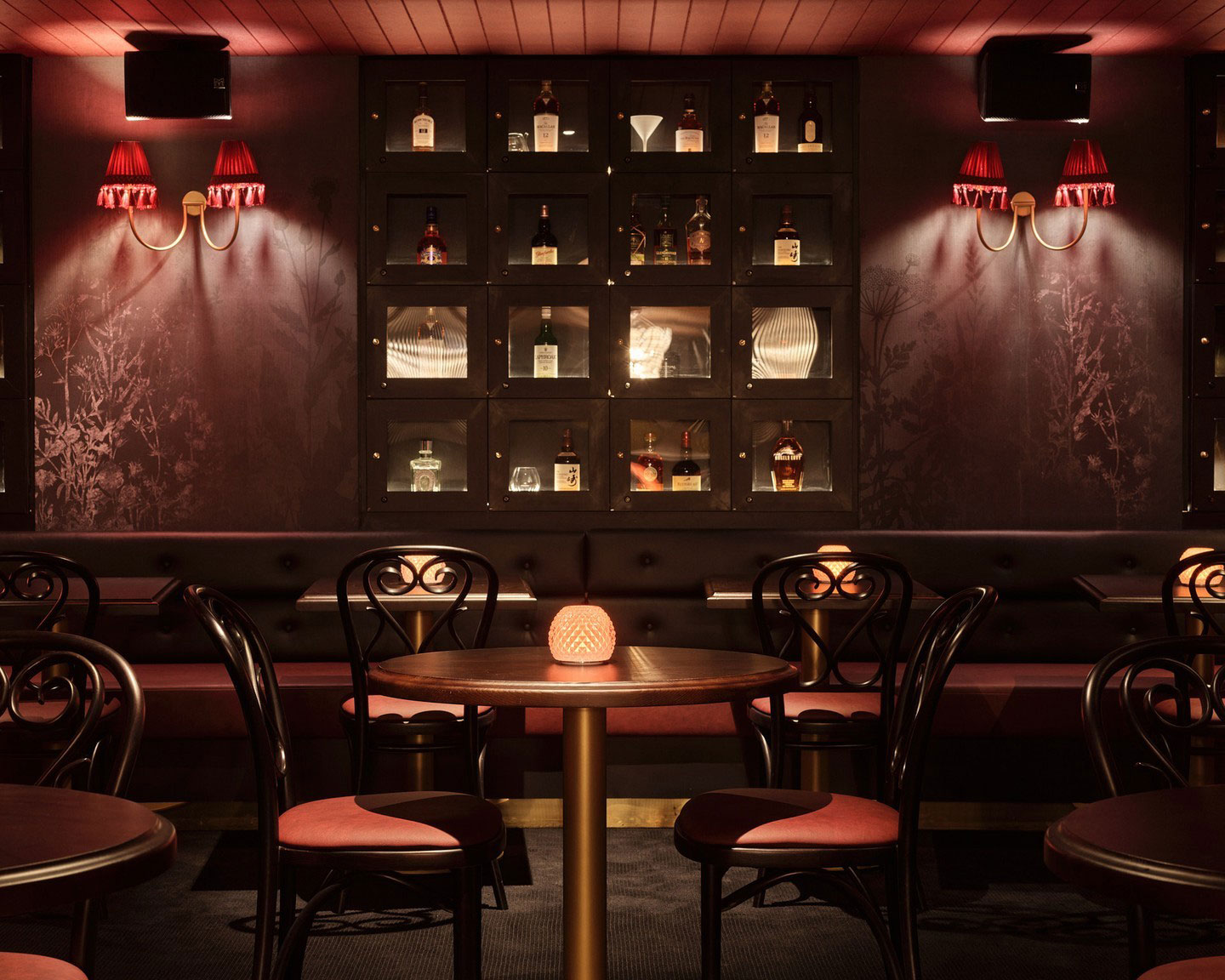 The red lamplit bar at Eau de Vie, one of the best bars in Sydney