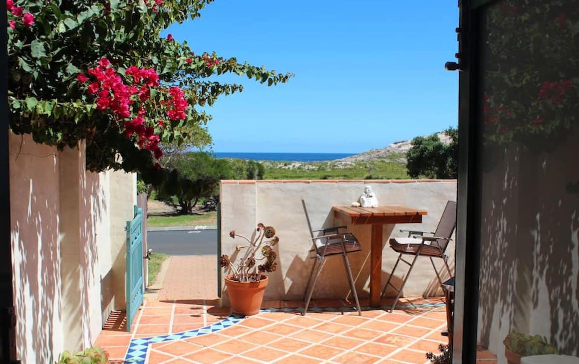 a courtyard looking out to the beach